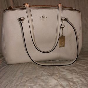 crisp white coach bag :)